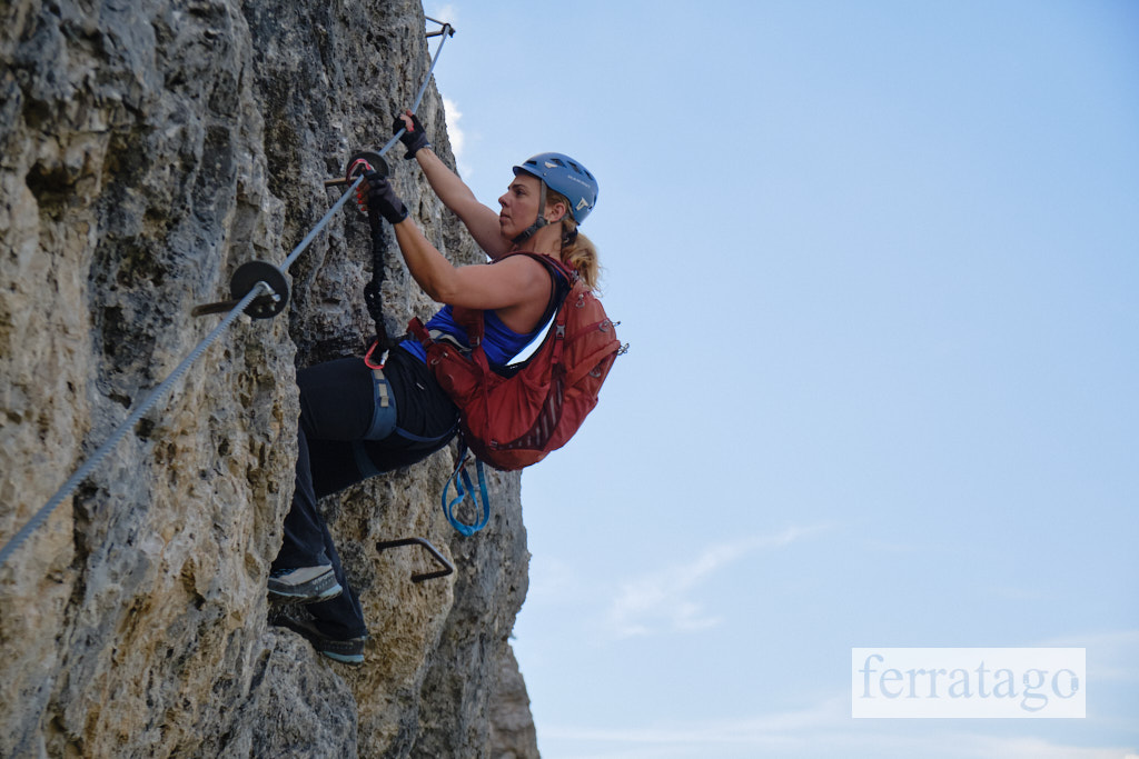 Woman on Sci Club 18 via ferrata